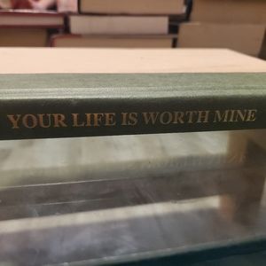 Your Life Is Worth Mine, Book